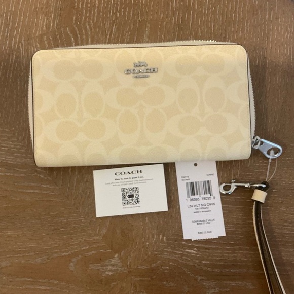 Women’s Long Zip Around Wallet In Signature Canvas - Picture 2 of 5